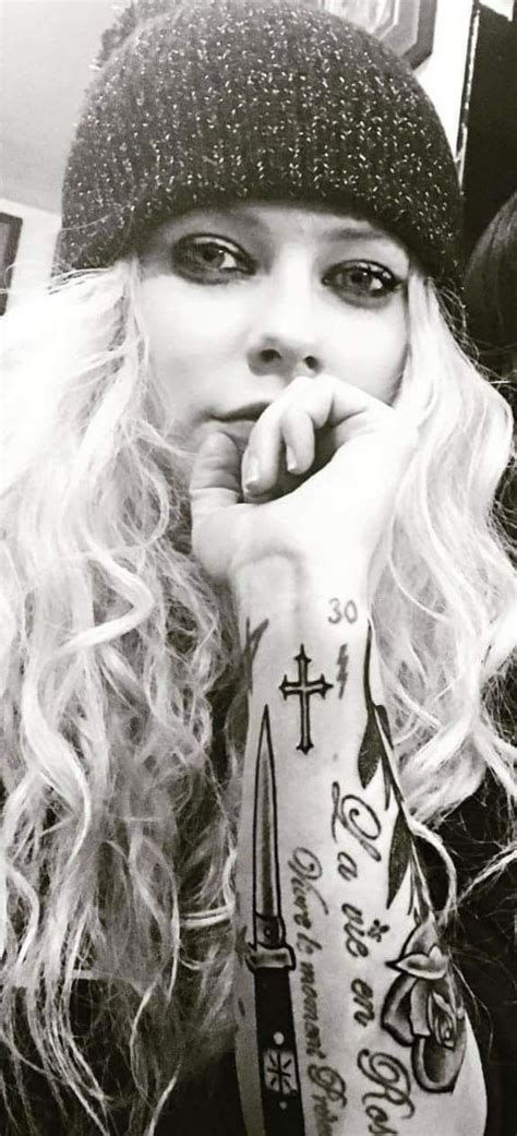 avril lavigne piercings|avril lavigne tattoos.